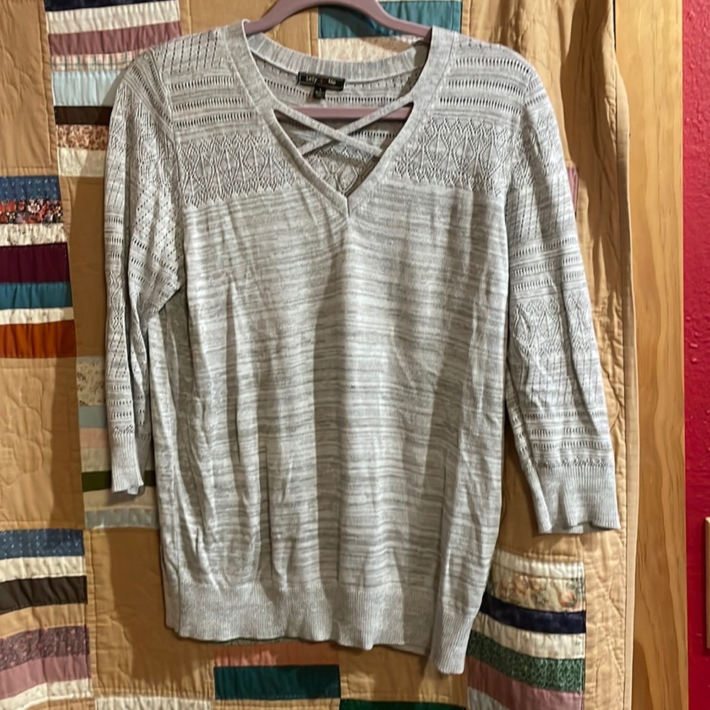 Selling a 3/4 length gray sweater. Size Large.